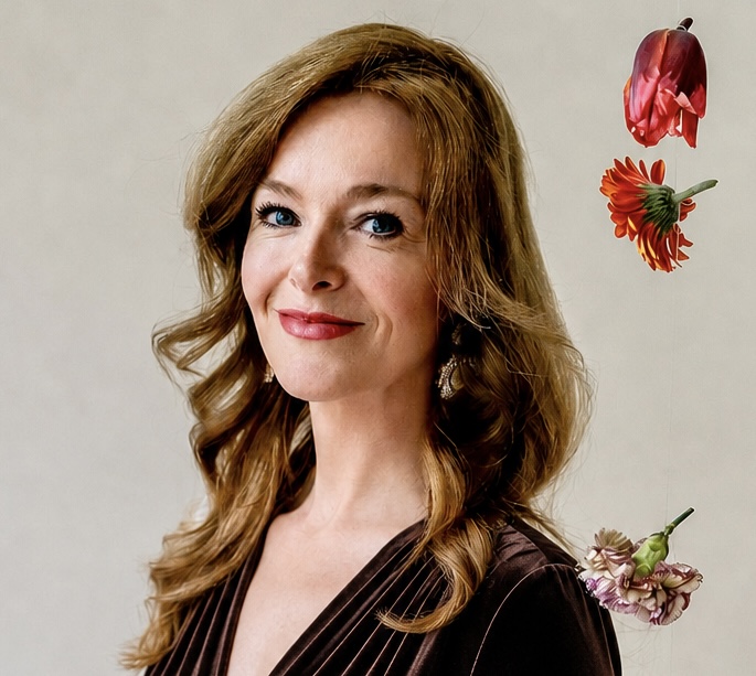 A woman in a dark-brown velvet dress, warm and composed